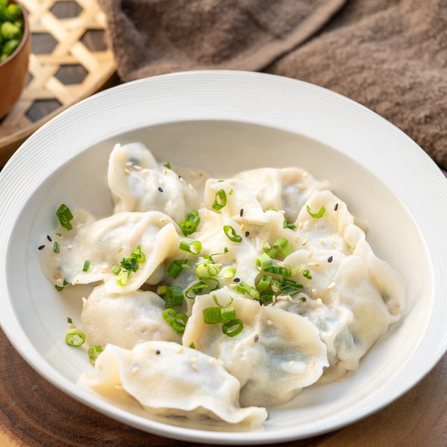 Boiled Pork & Sweet Corn Dumplings.